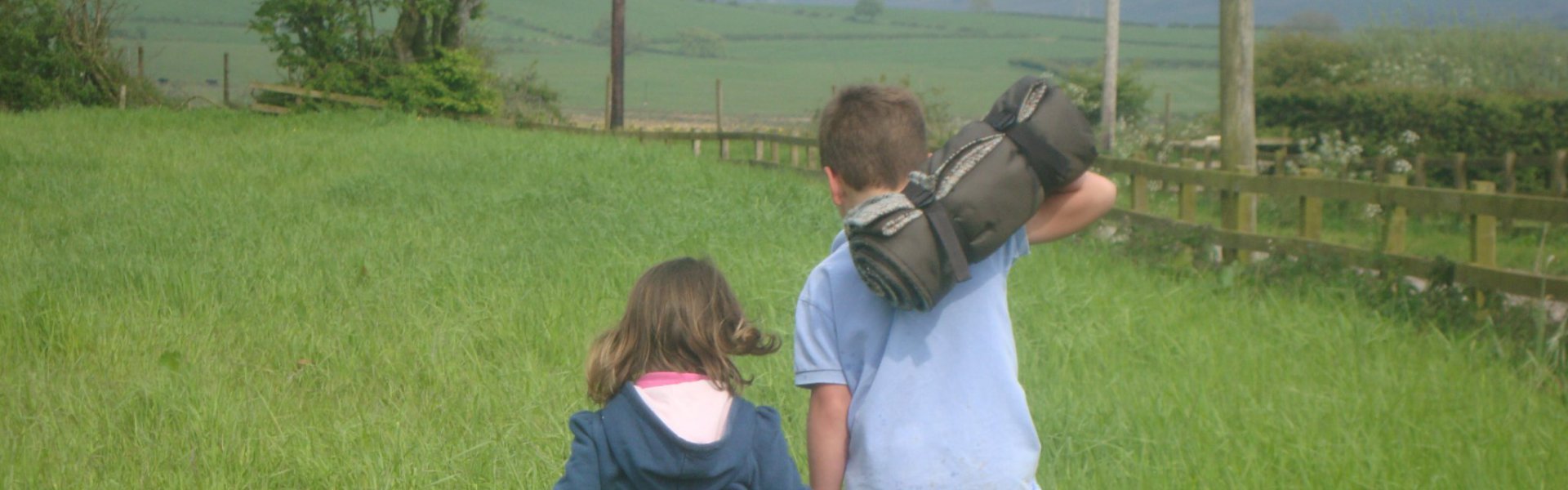 Children with recycled picnic blanket from Solway Blankets